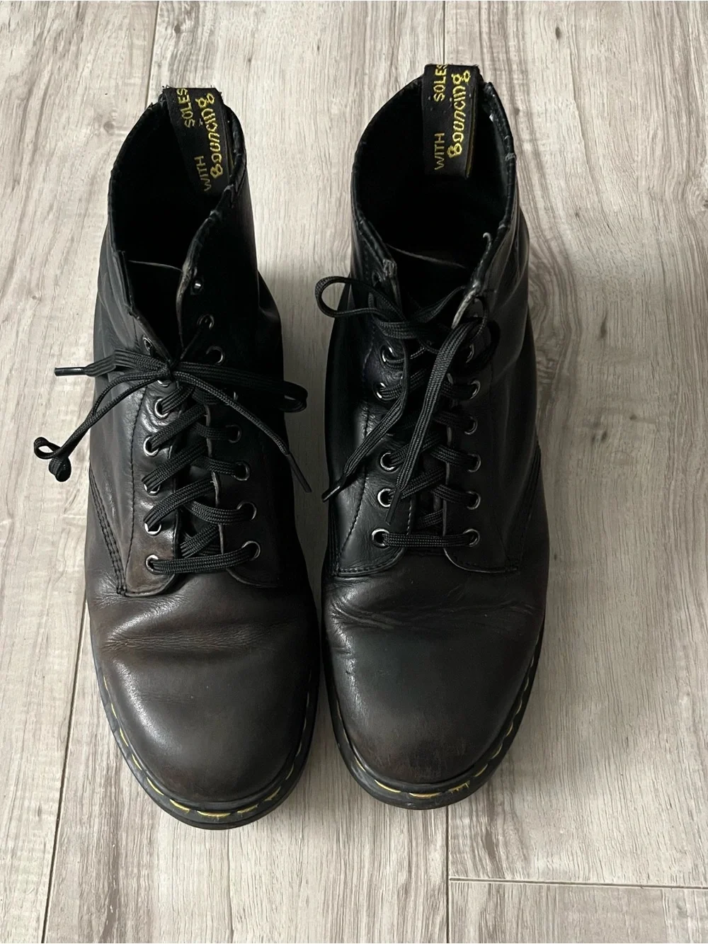 Dr. Martens Black Leather Lace-Up Combat Boots with Yellow Stitching